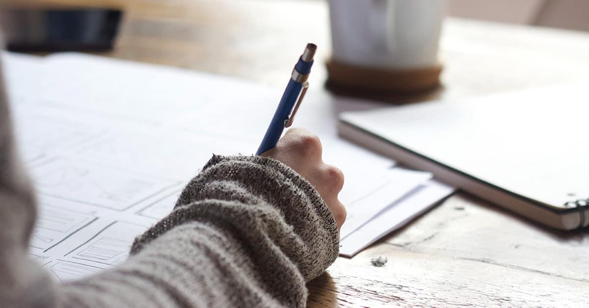 Girl Studying for Master's Degree and Writing Notes