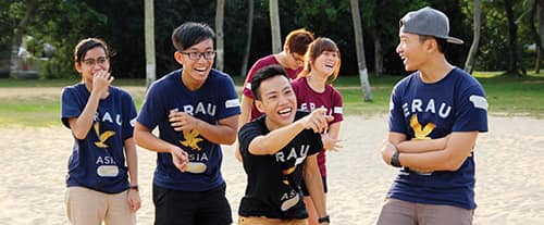 Embry-Riddle Asia students on a beach