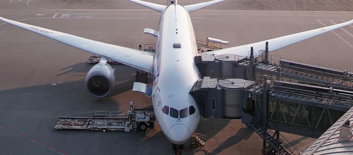 airplane on a tarmac at an airport