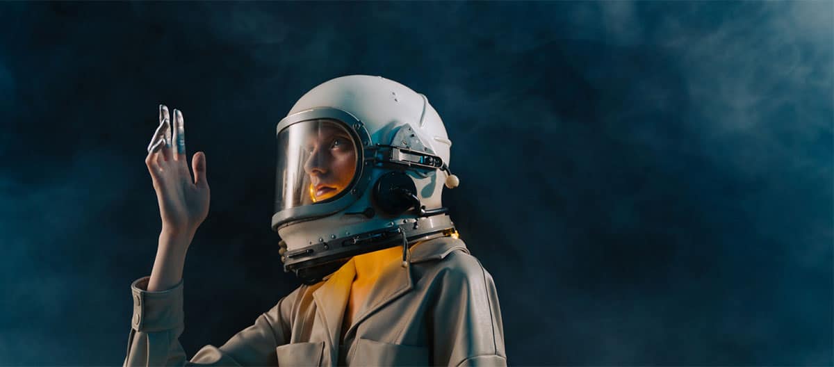 Person wearing astronaut helmet