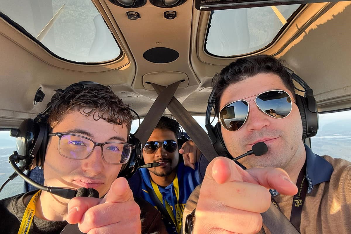 Embry-Riddle Student Government Association presidents Christopher Sorensen, Sreenath “Sree” Vijayakumar and Ander Turueno Garcia fly over the Daytona Beach area